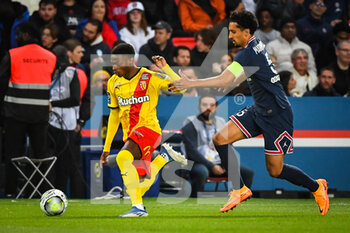 2022-04-23 - David PEREIRA DA COSTA of Lens and MARQUINHOS of PSG during the French championship Ligue 1 football match between Paris Saint-Germain and RC Lens on April 23, 2022 at Parc des Princes stadium in Paris, France - PARIS SAINT-GERMAIN VS RC LENS - FRENCH LIGUE 1 - SOCCER
