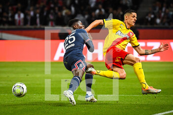 23/04/2022 - Nuno MENDES of PSG and Florian SOTOCA of Lens during the French championship Ligue 1 football match between Paris Saint-Germain and RC Lens on April 23, 2022 at Parc des Princes stadium in Paris, France - PARIS SAINT-GERMAIN VS RC LENS - FRENCH LIGUE 1 - CALCIO
