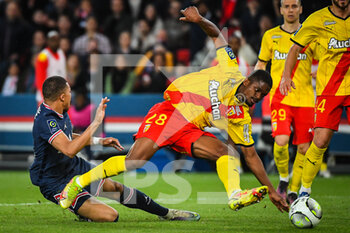 2022-04-23 - Kylian MBAPPE of PSG and Cheick DOUCOURE of Lens during the French championship Ligue 1 football match between Paris Saint-Germain and RC Lens on April 23, 2022 at Parc des Princes stadium in Paris, France - PARIS SAINT-GERMAIN VS RC LENS - FRENCH LIGUE 1 - SOCCER
