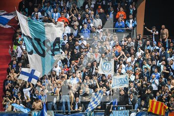2022-04-24 - Supporters of Marseille during the French championship Ligue 1 football match between Stade de Reims and Olympique de Marseille on April 24, 2022 at Auguste Delaune stadium in Reims, France - STADE DE REIMS VS OLYMPIQUE DE MARSEILLE - FRENCH LIGUE 1 - SOCCER
