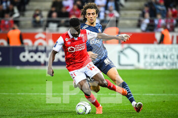 2022-04-24 - Azor MATUSIWA of Reims and Matteo GUENDOUZI of Marseille during the French championship Ligue 1 football match between Stade de Reims and Olympique de Marseille on April 24, 2022 at Auguste Delaune stadium in Reims, France - STADE DE REIMS VS OLYMPIQUE DE MARSEILLE - FRENCH LIGUE 1 - SOCCER