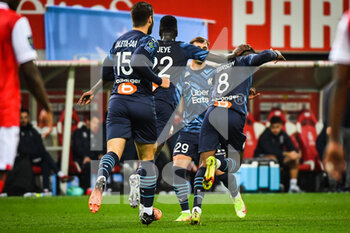 2022-04-24 - Gerson of Marseille celebrate his goal with teammates during the French championship Ligue 1 football match between Stade de Reims and Olympique de Marseille on April 24, 2022 at Auguste Delaune stadium in Reims, France - STADE DE REIMS VS OLYMPIQUE DE MARSEILLE - FRENCH LIGUE 1 - SOCCER