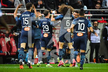 2022-04-24 - Gerson of Marseille celebrate his goal with teammates during the French championship Ligue 1 football match between Stade de Reims and Olympique de Marseille on April 24, 2022 at Auguste Delaune stadium in Reims, France - STADE DE REIMS VS OLYMPIQUE DE MARSEILLE - FRENCH LIGUE 1 - SOCCER