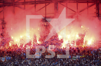 2022-05-01 - Flares from supporters of 'south winners' during the French championship Ligue 1 football match between Olympique de Marseille (OM) and Olympique Lyonnais (OL, Lyon) on May 1, 2022 at Stade Velodrome in Marseille, France - OLYMPIQUE DE MARSEILLE (OM) VS OLYMPIQUE LYONNAIS (OL, LYON) - FRENCH LIGUE 1 - SOCCER
