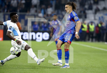 2022-05-01 - Malo Gusto of Lyon, Bamba Dieng of Marseille (left) during the French championship Ligue 1 football match between Olympique de Marseille (OM) and Olympique Lyonnais (OL, Lyon) on May 1, 2022 at Stade Velodrome in Marseille, France - OLYMPIQUE DE MARSEILLE (OM) VS OLYMPIQUE LYONNAIS (OL, LYON) - FRENCH LIGUE 1 - SOCCER