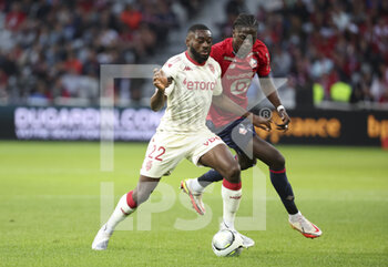 2022-05-06 - Youssouf Fofana of Monaco, Amadou Onana of Lille during the French championship Ligue 1 football match between Lille OSC (LOSC) and AS Monaco (ASM) on May 6, 2022 at Stade Pierre Mauroy in Villeneuve d'Ascq near Lille, France - LOSC LILLE VS AS MONACO - FRENCH LIGUE 1 - SOCCER