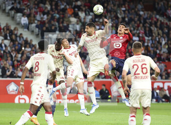 2022-05-06 - Benoit Badiashile, Vanderson de Oliveira Campos, Guillermo Maripan of Monaco, Benjamin Andre of Lille during the French championship Ligue 1 football match between Lille OSC (LOSC) and AS Monaco (ASM) on May 6, 2022 at Stade Pierre Mauroy in Villeneuve d'Ascq near Lille, France - LOSC LILLE VS AS MONACO - FRENCH LIGUE 1 - SOCCER