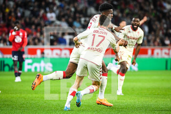 2022-05-06 - Aurelien TCHOUAMENI of Monaco celebrate his goal with Aleksandr GOLOVIN of Monaco during the French championship Ligue 1 football match between LOSC Lille and AS Monaco on May 6, 2022 at Pierre Mauroy stadium in Villeneuve-d'Ascq near Lille, France - LOSC LILLE VS AS MONACO - FRENCH LIGUE 1 - SOCCER