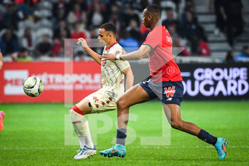 2022-05-06 - Vanderson DE OLIVEIRA CAMPOS of Monaco and Tiago DJALO of Lille during the French championship Ligue 1 football match between LOSC Lille and AS Monaco on May 6, 2022 at Pierre Mauroy stadium in Villeneuve-d'Ascq near Lille, France - LOSC LILLE VS AS MONACO - FRENCH LIGUE 1 - SOCCER