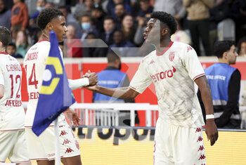 2022-05-06 - Aurelien Tchouameni of Monaco celebrates his winning goal with Ismail Jakobs (left) during the French championship Ligue 1 football match between Lille OSC (LOSC) and AS Monaco (ASM) on May 6, 2022 at Stade Pierre Mauroy in Villeneuve d'Ascq near Lille, France - LOSC LILLE VS AS MONACO - FRENCH LIGUE 1 - SOCCER
