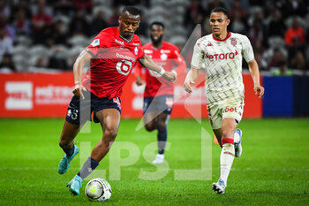 2022-05-06 - Tiago DJALO of Lille and Vanderson DE OLIVEIRA CAMPOS of Monaco during the French championship Ligue 1 football match between LOSC Lille and AS Monaco on May 6, 2022 at Pierre Mauroy stadium in Villeneuve-d'Ascq near Lille, France - LOSC LILLE VS AS MONACO - FRENCH LIGUE 1 - SOCCER