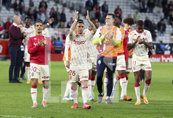 2022-05-06 - Wissam Ben Yedder, Ruben Aguilar, goalkeeper of Monaco Vito Mannone and teammates celebrate the victory with the supporters following the French championship Ligue 1 football match between Lille OSC (LOSC) and AS Monaco (ASM) on May 6, 2022 at Stade Pierre Mauroy in Villeneuve d'Ascq near Lille, France - LOSC LILLE VS AS MONACO - FRENCH LIGUE 1 - SOCCER