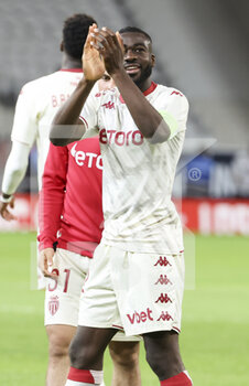 2022-05-06 - Youssouf Fofana of Monaco celebrates the victory with the supporters following the French championship Ligue 1 football match between Lille OSC (LOSC) and AS Monaco (ASM) on May 6, 2022 at Stade Pierre Mauroy in Villeneuve d'Ascq near Lille, France - LOSC LILLE VS AS MONACO - FRENCH LIGUE 1 - SOCCER