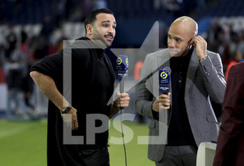 08/05/2022 - Injured Adil Rami of Troyes, Thierry Henry, pundit for Amazon Prime Video following the French championship Ligue 1 football match between Paris Saint-Germain and ESTAC Troyes on May 8, 2022 at Parc des Princes stadium in Paris, France - PARIS SAINT-GERMAIN VS ESTAC TROYES - FRENCH LIGUE 1 - CALCIO