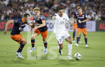 2022-05-14 - Angel Di Maria of PSG, left Arnaud Souquet, Nicolas Cozza of Montpellier during the French championship Ligue 1 football match between Montpellier HSC and Paris Saint-Germain on May 14, 2022 at La Mosson stadium in Montpellier, France - MONTPELLIER HSC VS PARIS SAINT-GERMAIN - FRENCH LIGUE 1 - SOCCER