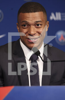 2022-05-23 - Kylian Mbappe of PSG during a press conference following the renewal of his contract at Paris Saint-Germain until 2025, on May 23, 2022 at Parc des Princes stadium in Paris, France - PRESS CONFERENCE FOLLOWING THE RENEWAL OF KYLIAN MBAPPE AT PARIS SAINT-GERMAIN UNTIL 2025 - FRENCH LIGUE 1 - SOCCER