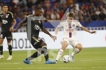 05/08/2022 - Mickael ALPHONSE of Ajaccio and Johann LEPENANT of Lyon during the French championship Ligue 1 football match between Olympique Lyonnais (Lyon) and AC Ajaccio on August 5, 2022 at Groupama stadium in Decines-Charpieu near Lyon, France - FOOTBALL - FRENCH CHAMP - LYON V AJACCIO - FRENCH LIGUE 1 - CALCIO