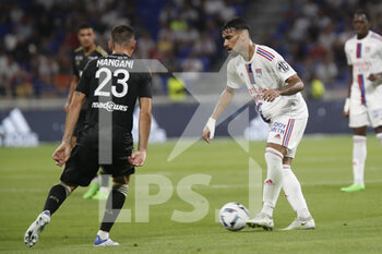 05/08/2022 - Lucas PAQUETA of Lyon and Thomas MANGANI of Ajaccio during the French championship Ligue 1 football match between Olympique Lyonnais (Lyon) and AC Ajaccio on August 5, 2022 at Groupama stadium in Decines-Charpieu near Lyon, France - FOOTBALL - FRENCH CHAMP - LYON V AJACCIO - FRENCH LIGUE 1 - CALCIO
