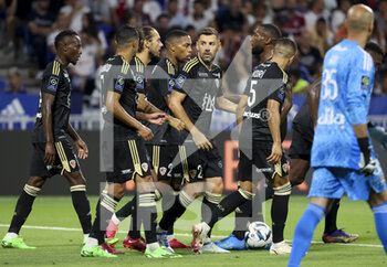 05/08/2022 - Thomas Mangani of Ajaccio celebrates his goal on a penalty kick with teammates during the French championship Ligue 1 football match between Olympique Lyonnais (OL) and AC Ajaccio (ACA) on August 5, 2022 at Groupama Stadium in Decines-Charpieu near Lyon, France - FOOTBALL - FRENCH CHAMP - LYON V AJACCIO - FRENCH LIGUE 1 - CALCIO