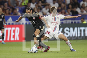05/08/2022 - Vincent MARCHETTI of Ajaccio and Johann LEPENANT of Lyon during the French championship Ligue 1 football match between Olympique Lyonnais (Lyon) and AC Ajaccio on August 5, 2022 at Groupama stadium in Decines-Charpieu near Lyon, France - FOOTBALL - FRENCH CHAMP - LYON V AJACCIO - FRENCH LIGUE 1 - CALCIO