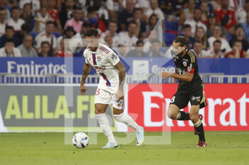 05/08/2022 - Corentin TOLISSO of Lyon and Vincent MARCHETTI of Ajaccio during the French championship Ligue 1 football match between Olympique Lyonnais (Lyon) and AC Ajaccio on August 5, 2022 at Groupama stadium in Decines-Charpieu near Lyon, France - FOOTBALL - FRENCH CHAMP - LYON V AJACCIO - FRENCH LIGUE 1 - CALCIO