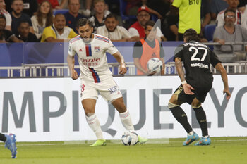 05/08/2022 - Rayan CHERKI of Lyon and Kevin SPADANUDA of Ajaccio during the French championship Ligue 1 football match between Olympique Lyonnais (Lyon) and AC Ajaccio on August 5, 2022 at Groupama stadium in Decines-Charpieu near Lyon, France - FOOTBALL - FRENCH CHAMP - LYON V AJACCIO - FRENCH LIGUE 1 - CALCIO