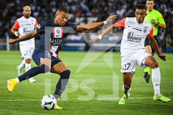 13/08/2022 - Kylian MBAPPE of PSG and Theo SAINTE-LUCE of Montpellier during the French championship Ligue 1 football match between Paris Saint-Germain and Montpellier HSC on August 13, 2022 at Parc des Princes stadium in Paris, France - FOOTBALL - FRENCH CHAMP - PARIS SG V MONTPELLIER - FRENCH LIGUE 1 - CALCIO