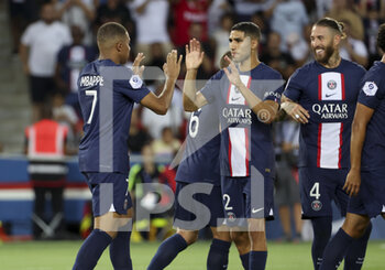 13/08/2022 - Kylian Mbappe of PSG (left) celebrates his goal with Achraf Hakimi, Sergio Ramos during the French championship Ligue 1 football match between Paris Saint-Germain (PSG) and Montpellier HSC (MHSC) on August 13, 2022 at Parc des Princes stadium in Paris, France - FOOTBALL - FRENCH CHAMP - PARIS SG V MONTPELLIER - FRENCH LIGUE 1 - CALCIO
