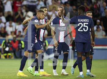 13/08/2022 - Kylian Mbappe of PSG (left) celebrates his goal with Achraf Hakimi, Sergio Ramos, Nuno Mendes during the French championship Ligue 1 football match between Paris Saint-Germain (PSG) and Montpellier HSC (MHSC) on August 13, 2022 at Parc des Princes stadium in Paris, France - FOOTBALL - FRENCH CHAMP - PARIS SG V MONTPELLIER - FRENCH LIGUE 1 - CALCIO