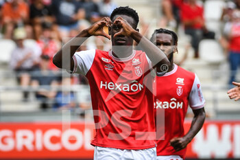 14/08/2022 - Folarin BALOGUN of Reims celebrates his goal during the French championship Ligue 1 football match between Stade de Reims and Clermont Foot 63 on August 14, 2022 at Auguste Delaune stadium in Reims, France - FOOTBALL - FRENCH CHAMP - REIMS V CLERMONT - FRENCH LIGUE 1 - CALCIO