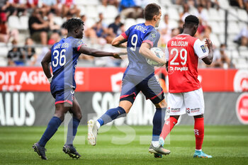 14/08/2022 - Komnen ANDRIC of Clermont celebrate his goal with Alidu SEIDU of Clermont during the French championship Ligue 1 football match between Stade de Reims and Clermont Foot 63 on August 14, 2022 at Auguste Delaune stadium in Reims, France - FOOTBALL - FRENCH CHAMP - REIMS V CLERMONT - FRENCH LIGUE 1 - CALCIO