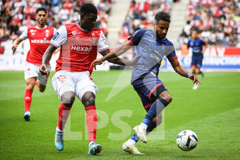 14/08/2022 - Marshall MUNETSI of Reims and Jim ALLEVINAH of Clermont during the French championship Ligue 1 football match between Stade de Reims and Clermont Foot 63 on August 14, 2022 at Auguste Delaune stadium in Reims, France - FOOTBALL - FRENCH CHAMP - REIMS V CLERMONT - FRENCH LIGUE 1 - CALCIO