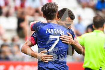 14/08/2022 - Komnen ANDRIC of Clermont celebrate his goal with Yohann MAGNIN of Clermont during the French championship Ligue 1 football match between Stade de Reims and Clermont Foot 63 on August 14, 2022 at Auguste Delaune stadium in Reims, France - FOOTBALL - FRENCH CHAMP - REIMS V CLERMONT - FRENCH LIGUE 1 - CALCIO