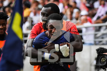 14/08/2022 - Muhammed CHAM of Clermont celebrate his goal with Grejohn KYEI of Clermont during the French championship Ligue 1 football match between Stade de Reims and Clermont Foot 63 on August 14, 2022 at Auguste Delaune stadium in Reims, France - FOOTBALL - FRENCH CHAMP - REIMS V CLERMONT - FRENCH LIGUE 1 - CALCIO