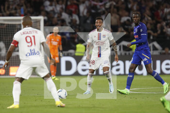 2022-08-19 - Corentin TOLISSO of Lyon and Alexandre LACAZETTE of Lyon during the French championship Ligue 1 football match between Olympique Lyonnais (Lyon) and ESTAC Troyes on August 19, 2022 at Groupama stadium in Decines-Charpieu near Lyon, France - FOOTBALL - FRENCH CHAMP - LYON V TROYES - FRENCH LIGUE 1 - SOCCER