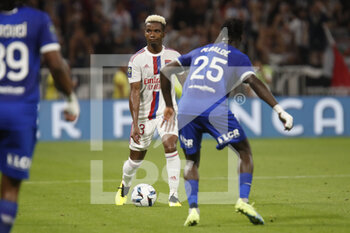 2022-08-19 - Thiago MENDES of Lyon and Mama BALDE of Troyes during the French championship Ligue 1 football match between Olympique Lyonnais (Lyon) and ESTAC Troyes on August 19, 2022 at Groupama stadium in Decines-Charpieu near Lyon, France - FOOTBALL - FRENCH CHAMP - LYON V TROYES - FRENCH LIGUE 1 - SOCCER