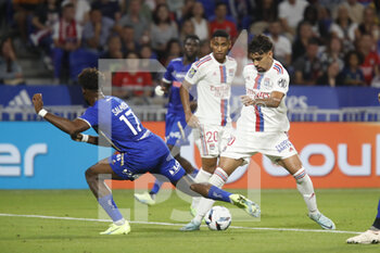 2022-08-19 - Lucas PAQUETA of Lyon and Yoann SALMIER of Troyes during the French championship Ligue 1 football match between Olympique Lyonnais (Lyon) and ESTAC Troyes on August 19, 2022 at Groupama stadium in Decines-Charpieu near Lyon, France - FOOTBALL - FRENCH CHAMP - LYON V TROYES - FRENCH LIGUE 1 - SOCCER