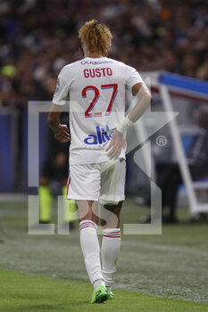 2022-08-19 - Malo GUSTO of Lyon hurt during the French championship Ligue 1 football match between Olympique Lyonnais (Lyon) and ESTAC Troyes on August 19, 2022 at Groupama stadium in Decines-Charpieu near Lyon, France - FOOTBALL - FRENCH CHAMP - LYON V TROYES - FRENCH LIGUE 1 - SOCCER