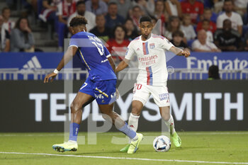 2022-08-19 - Furacao TETE of Lyon and Yoann SALMIER of Troyes during the French championship Ligue 1 football match between Olympique Lyonnais (Lyon) and ESTAC Troyes on August 19, 2022 at Groupama stadium in Decines-Charpieu near Lyon, France - FOOTBALL - FRENCH CHAMP - LYON V TROYES - FRENCH LIGUE 1 - SOCCER