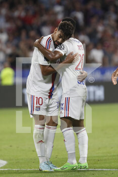 2022-08-19 - Lucas PAQUETA of Lyon and Furacao TETE of Lyon during the French championship Ligue 1 football match between Olympique Lyonnais (Lyon) and ESTAC Troyes on August 19, 2022 at Groupama stadium in Decines-Charpieu near Lyon, France - FOOTBALL - FRENCH CHAMP - LYON V TROYES - FRENCH LIGUE 1 - SOCCER