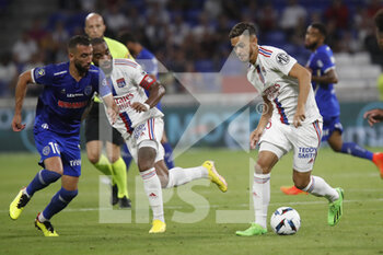 2022-08-19 - Romain FAIVRE of Lyon and Florian TARDIEU of Troyes and Alexandre LACAZETTE of Lyon during the French championship Ligue 1 football match between Olympique Lyonnais (Lyon) and ESTAC Troyes on August 19, 2022 at Groupama stadium in Decines-Charpieu near Lyon, France - FOOTBALL - FRENCH CHAMP - LYON V TROYES - FRENCH LIGUE 1 - SOCCER