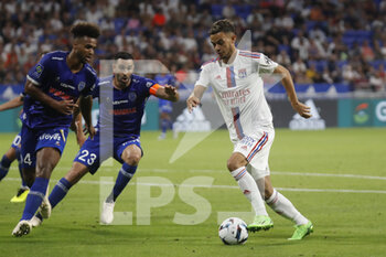 2022-08-19 - Romain FAIVRE of Lyon and Erik PALMER-BROWN of Troyes and Adil RAMI of Troyes during the French championship Ligue 1 football match between Olympique Lyonnais (Lyon) and ESTAC Troyes on August 19, 2022 at Groupama stadium in Decines-Charpieu near Lyon, France - FOOTBALL - FRENCH CHAMP - LYON V TROYES - FRENCH LIGUE 1 - SOCCER