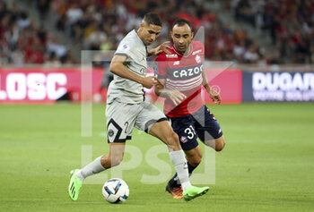 2022-08-21 - Achraf Hakimi of PSG, Ismaily Goncalves Santos of Lille during the French championship Ligue 1 football match between LOSC Lille and Paris Saint-Germain on August 21, 2022 at Stade Pierre Mauroy in Villeneuve-d'Ascq near Lille, France - FOOTBALL - FRENCH CHAMP - LILLE V PARIS SG - FRENCH LIGUE 1 - SOCCER