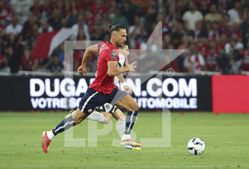 2022-08-21 - Yusuf Yazici of Lille during the French championship Ligue 1 football match between LOSC Lille and Paris Saint-Germain on August 21, 2022 at Stade Pierre Mauroy in Villeneuve-d'Ascq near Lille, France - FOOTBALL - FRENCH CHAMP - LILLE V PARIS SG - FRENCH LIGUE 1 - SOCCER