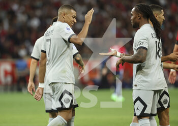 2022-08-21 - Kylian Mbappe of PSG celebrates his goal with Renato Sanches during the French championship Ligue 1 football match between LOSC Lille and Paris Saint-Germain on August 21, 2022 at Stade Pierre Mauroy in Villeneuve-d'Ascq near Lille, France - FOOTBALL - FRENCH CHAMP - LILLE V PARIS SG - FRENCH LIGUE 1 - SOCCER