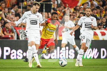 2022-08-27 - Joe RODON of Rennes, Lois OPENDA of Lens and Flavien TAIT of Rennes during the French championship Ligue 1 football match between RC Lens and Stade Rennais (Rennes) on August 27, 2022 at Bollaert-Delelis stadium in Lens, France - FOOTBALL - FRENCH CHAMP - LENS V RENNES - FRENCH LIGUE 1 - SOCCER