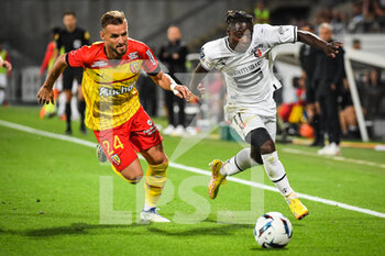 2022-08-27 - Jonathan GRADIT of Lens and Jeremy DOKU of Rennes during the French championship Ligue 1 football match between RC Lens and Stade Rennais (Rennes) on August 27, 2022 at Bollaert-Delelis stadium in Lens, France - FOOTBALL - FRENCH CHAMP - LENS V RENNES - FRENCH LIGUE 1 - SOCCER