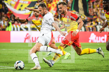 2022-08-27 - Flavien TAIT of Rennes and Jonathan GRADIT of Lens during the French championship Ligue 1 football match between RC Lens and Stade Rennais (Rennes) on August 27, 2022 at Bollaert-Delelis stadium in Lens, France - FOOTBALL - FRENCH CHAMP - LENS V RENNES - FRENCH LIGUE 1 - SOCCER