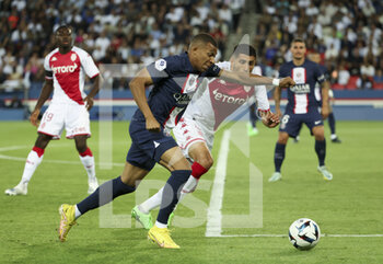 2022-08-28 - Kylian Mbappe of PSG, Guillermo Maripan of Monaco during the French championship Ligue 1 football match between Paris Saint-Germain (PSG) and AS Monaco (ASM) on August 28, 2022 at Parc des Princes stadium in Paris, France - FOOTBALL - FRENCH CHAMP - PARIS SG V MONACO - FRENCH LIGUE 1 - SOCCER