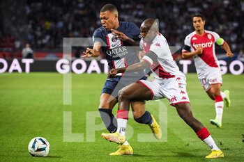 2022-08-28 - Kylian MBAPPE of PSG and Mohamed CAMARA of Monaco during the French championship Ligue 1 football match between Paris Saint-Germain and AS Monaco on August 28, 2022 at Parc des Princes stadium in Paris, France - FOOTBALL - FRENCH CHAMP - PARIS SG V MONACO - FRENCH LIGUE 1 - SOCCER